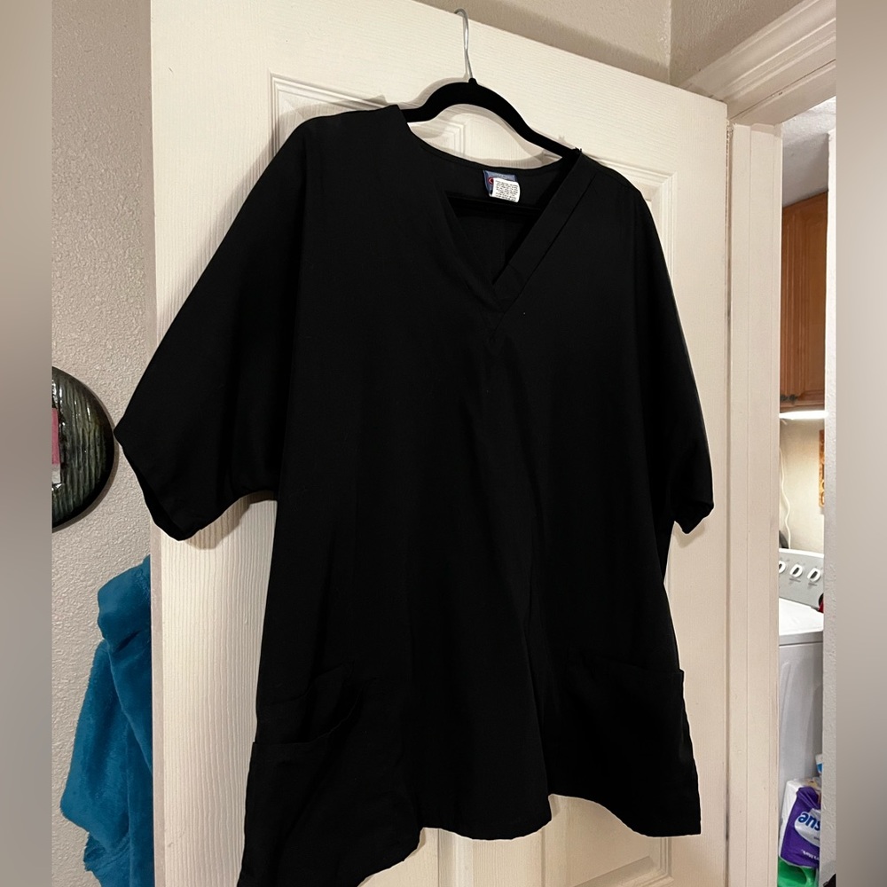 Brand new scrub top. Solid black…never worn